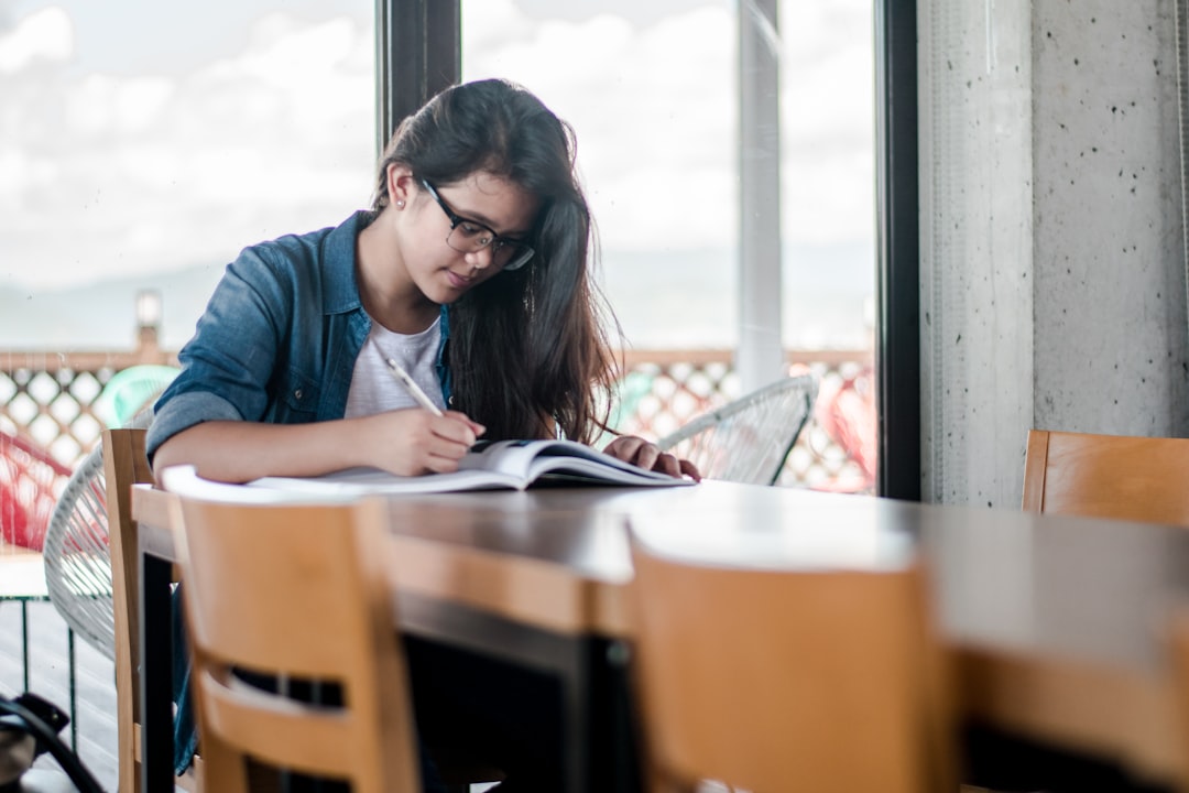Student reviewing notes at a study desk